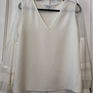 Express bell sleeve top